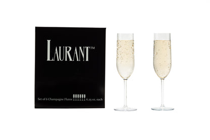 two of the best plastic champagne flutes sitting next to their black packaging cleanly