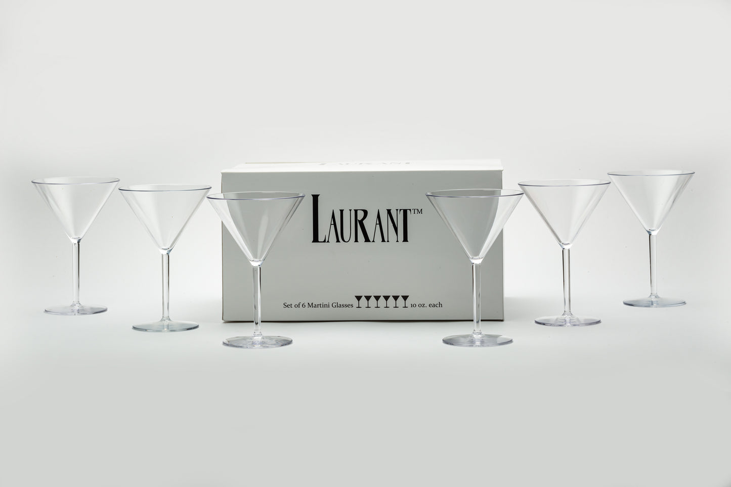 a set of 6 disposable martini glasses set next to their packaging eloquently